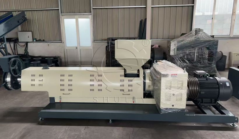 HDPE PP pelletizing line machine in a factory, shown with extruder, motor, and feeding hopper